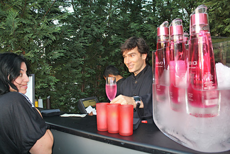 Andres Alexis serves up cocktails at the Celebrity Catwalk event.