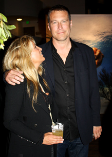 Sex and The City's John Corbett took in the sea breeze this night at the Shangri-la; with party guest Karyn Fitzpatrick.