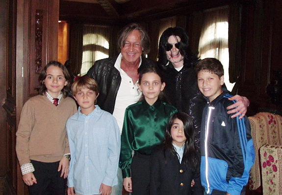 Recent photo of Michael Jackson with his friend/landlord and children.