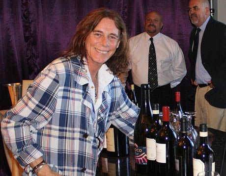 Celebrity Stylist George Blodwell embraces the fine wines.