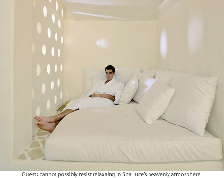 A guest relaxes in a Spa Luce treatment room