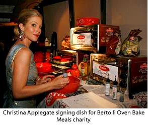 Christina Applegage signs Bertolli dish for charity.