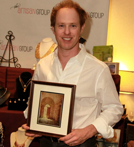 Actor/Producer Raphael Sbarge with art from the Artesan Group