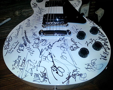 Autographed Gibson Guitar to be auctioned off for charity.