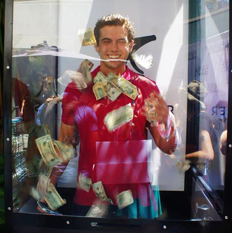 LA's The Place Magazine journalist Tyler Emery collects cash for charity.