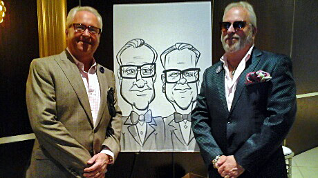 Mark Harris and Matt Harris with their caricatures.