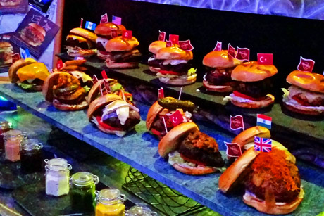 An array of amazing burgers representing cities & countries all over the globe.