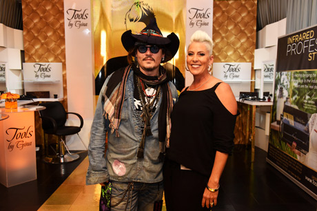 Actor/ musician Johnny Depp (L) of The Hollywood Vampires and Tools by Gina founder Gina Rivera attend the GRAMMY Gift Lounge during The 58th GRAMMY Awards at Staples Center on February 13, 2016 in Los Angeles, California.