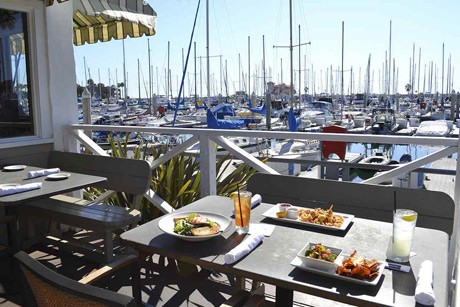 Located in Redondo Beach, has upped the waterfront dining ante in the South Bay with the opening of a spectacular new outdoor dining patio with fire pit, lounge area and seating for 80 overlooking King Harbor Marina.