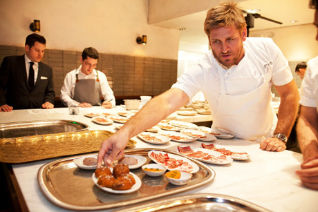 Celebrity Chef Curtis Stone creating special cuisine with Australian food products.