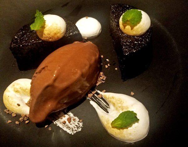 This flourless chocolate cake with the most diving chocolate pepperment ice cream and marshmallow is unforgettable!