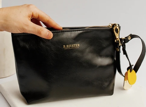 R Rivetor handbags by military spouses