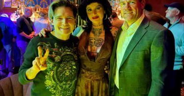 Corey Feldman with girlfriend Adrien Skye and Caesars executive Justen Crews